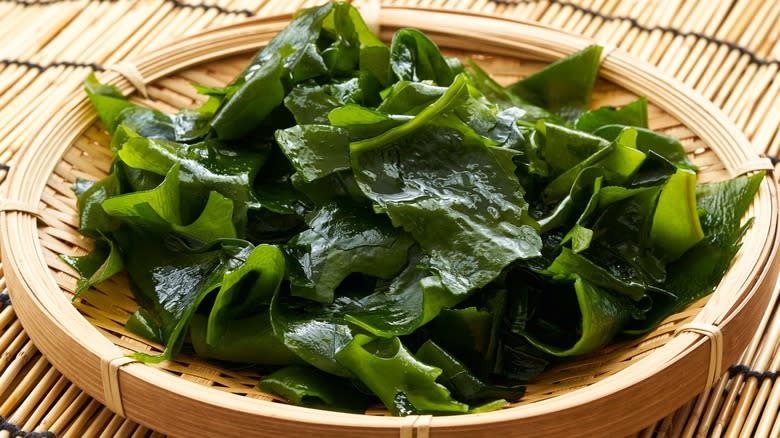 Closeup of seaweed on a wooden plate