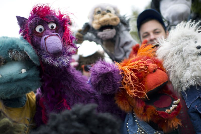 PBS supporters take part in the Million Puppet March in Washington, D.C., on November 3, 2012. The bipartisan march was organized to show support for Public Broadcasting following Republican Presidential Candidate Mitt Romney's pledge to cut funding to PBS. On October 5, 1970, PBS, was founded. UPI/Kevin Dietsch