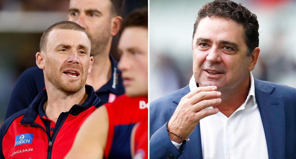 On the right is Melbourne Demons great Garry Lyon and coach Simon Goodwin on left.