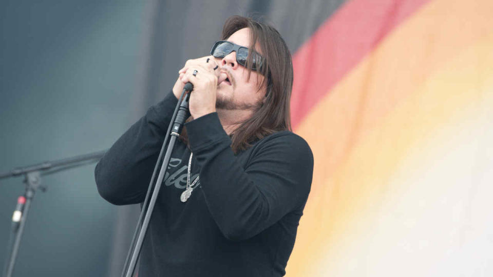 John Garcia of Kyuss Lives performing onstage in 2011