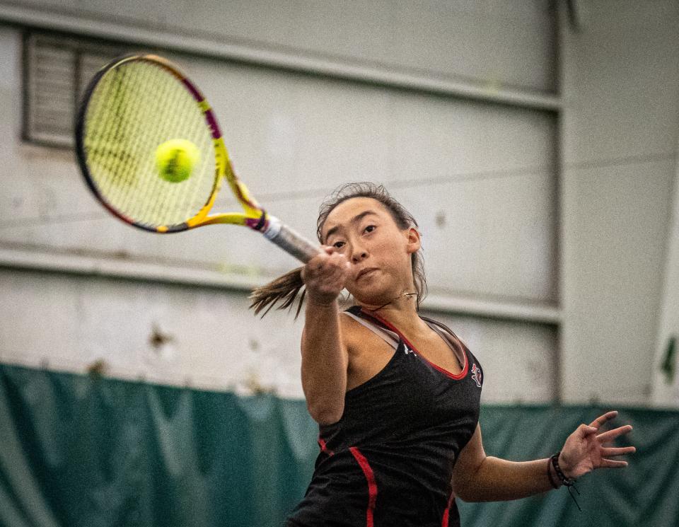 Auburn's Avery Trapp hits a forehand during a game in the Rockford tennis sectionals on Friday, Oct. 13, 2023, at Boylan High School.