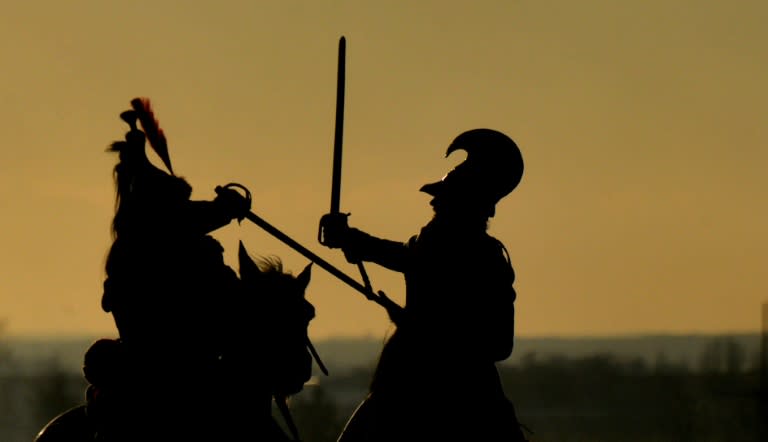 History enthusiasts dressed as soldiers take part in a re-enactment of Napoleon's 1805 Battle of Austerlitz near the South Moravian city of Slavkov on December 3, 2016