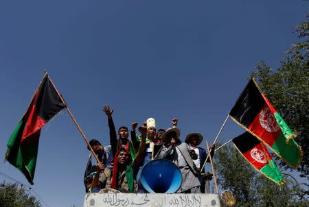 Demonstrators from Afghanistan's Hazara minority attend a protest in Kabul, Afghanistan July 23, 2016. REUTERS/Mohammad Ismail