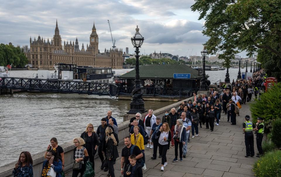 The queue to pay respects to the late Queen at Westminster is almost five miles long - Carl Court/Getty Images