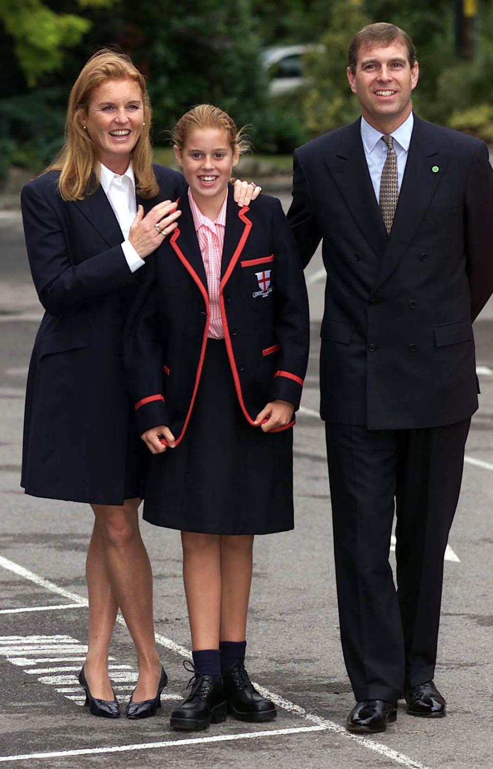 Princess Beatrice arrives for her first day at St George's School in Ascot, Berkshire, with her parents the Duke and Duchess of York, in 2000. [Photo: PA]