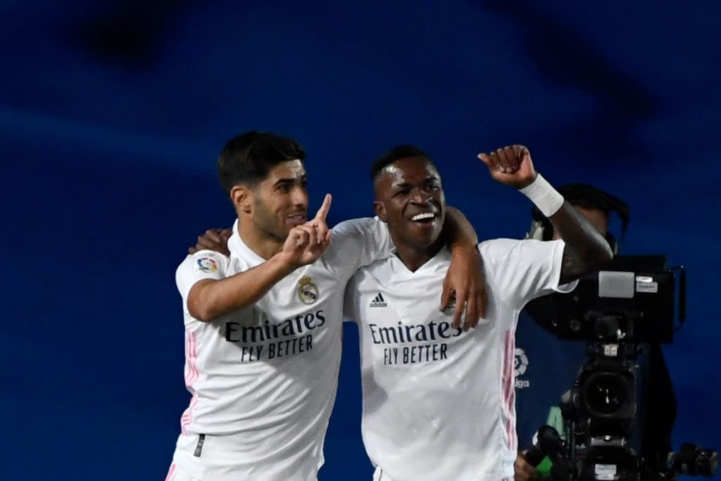 Asensio and Vinicius Jr for Real Madrid (AFP via Getty Images)