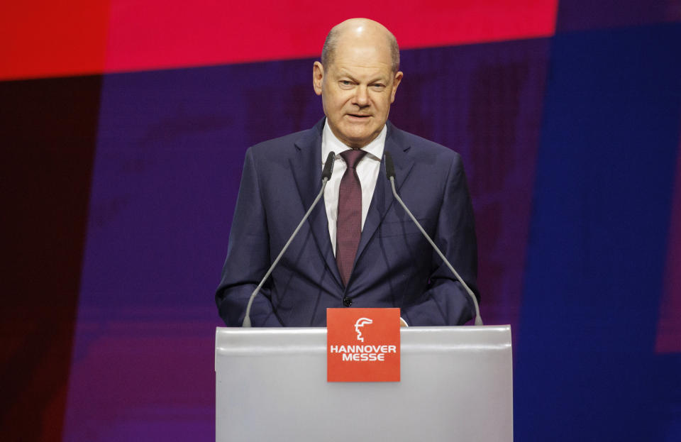 German Chancellor Olaf Scholz delivers a speach during the opening of the Hanover Messe industrial trade fair at the HCC Hanover Congress Centrum in Hanover, Germany, Sunday, April 16, 2023. German Chancellor Olaf Scholz said Sunday that he will press for a trade agreement between the European Union and Indonesia as part of his country’s efforts to reduce its reliance on China for crucial raw materials. (Michael Matthey/dpa via AP)