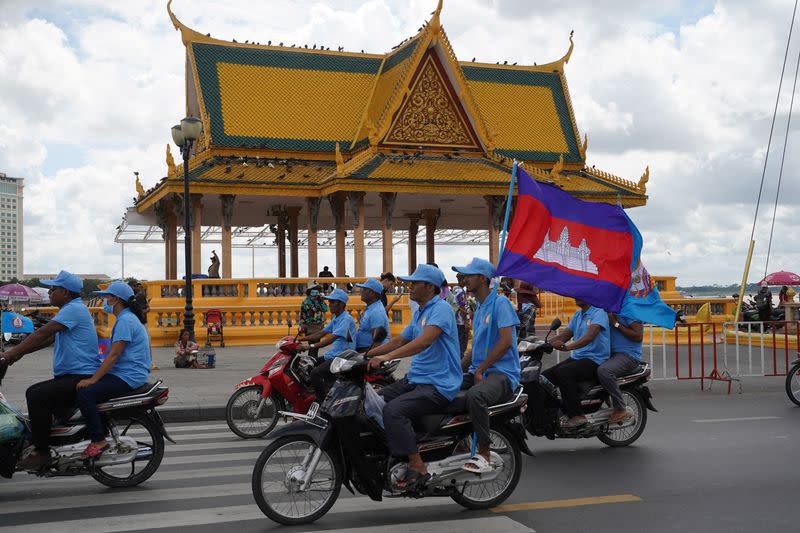 Supporters of Cambodia’s Prime Minister Hun Sen and Cambodian People’s Party attend an election campaign for the upcoming national election in Phnom Penh