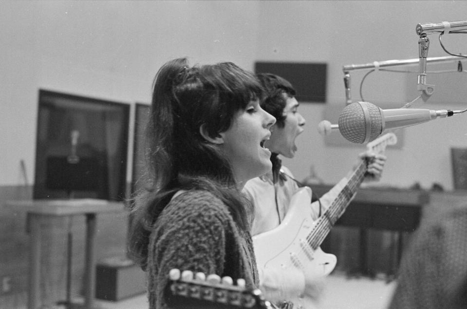 Grace Slick belts out a song in the studio. Slick, a former model, became the face and voice of San Francisco's music scene when he joined the Jefferson Airplane and guided songs like "White Rabbit" to the top of the charts in the late '60s.