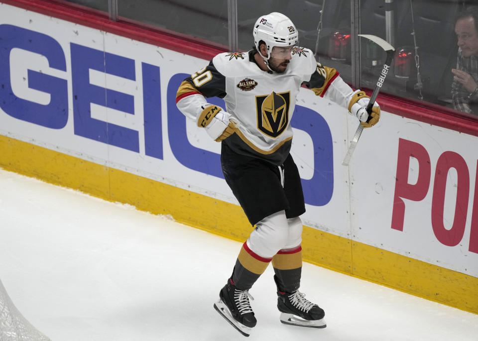 Vegas Golden Knights center Chandler Stephenson celebrates after scoring a goal against the Colorado Avalanche in the first period of an NHL hockey game Tuesday, Oct. 26, 2021, in Denver. (AP Photo/David Zalubowski)