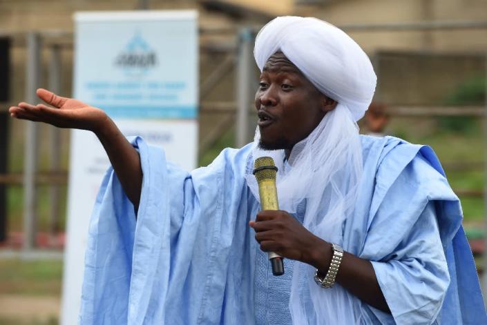 Guest speaker Soliu Kewugbemi speaks at the Nasrul-lahi-li Fathi Society of Nigeria (AFP Photo/PIUS UTOMI EKPEI)