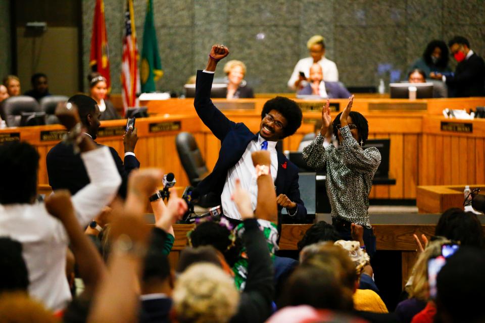 Justin Pearson celebrates with supporters after being reinstated to the the Tennessee House of Representatives by the Shelby County Board of Commissioners in Memphis, Tenn., on Wednesday, April 12, 2023.