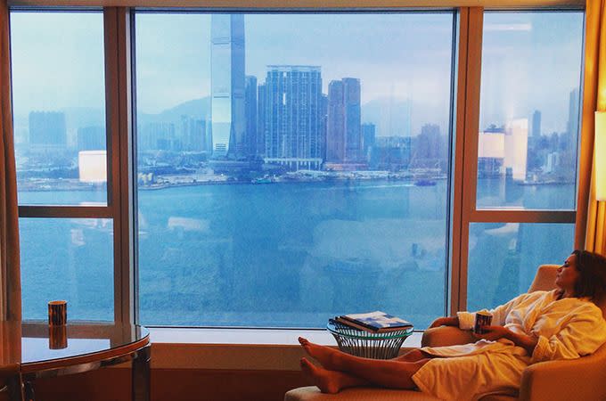 Relaxing at the Four Seasons with a view of Victoria Harbour. Photo: Skye Gilkeson