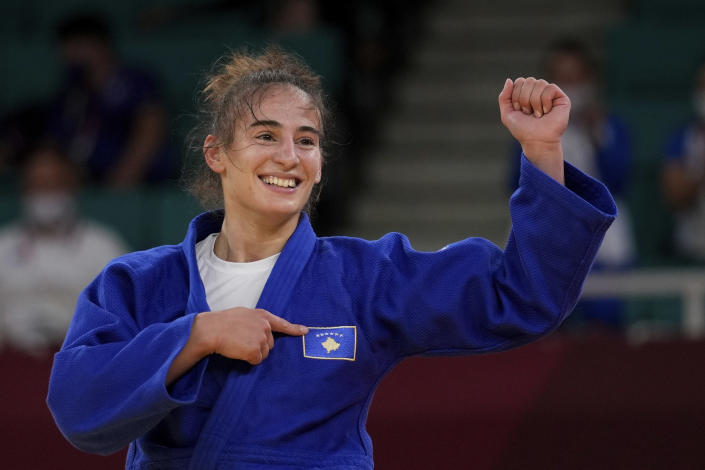 Nora Gjakova of Kosovo reacts during her women's -57kg semifinal judo match against Tsukasa Yoshida of Japan, at the 2020 Summer Olympics in Tokyo, Japan, Monday, July 26, 2021. (AP Photo/Vincent Thian)
