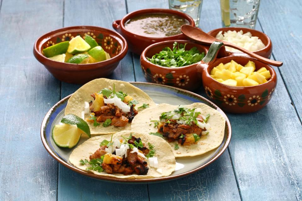 <p>This Mexican staple is a vibrant, flavorful taco that combines smoky pork with sweet pineapple for the perfect bite. The pork is traditionally marinated in spices and chilies, then slow roasted on a spit (called a trompo) with slices of pineapple that release their juices while it cooks.</p><p><a class="link " href="https://go.redirectingat.com?id=74968X1596630&url=https%3A%2F%2Fwww.walmart.com%2Fsearch%2F%3Fquery%3Dtortilla%2Bwarmer&sref=https%3A%2F%2Fwww.thepioneerwoman.com%2Ffood-cooking%2Fmeals-menus%2Fg36008054%2Ftypes-of-tacos%2F" rel="nofollow noopener" target="_blank" data-ylk="slk:SHOP TORTILLA WARMERS;elm:context_link;itc:0;sec:content-canvas">SHOP TORTILLA WARMERS</a></p>