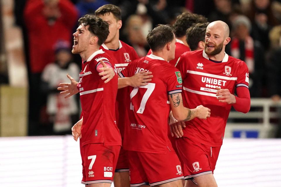 Middlesbrough’s Hayden Hackney, left, celebrates scoring his side’s winner (PA Wire)