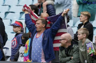 A supporter of the United States team reacts during the international soccer match against Australia at Stadium Australia in Sydney, Saturday, Nov. 27, 2021. (AP Photo/Mark Baker)