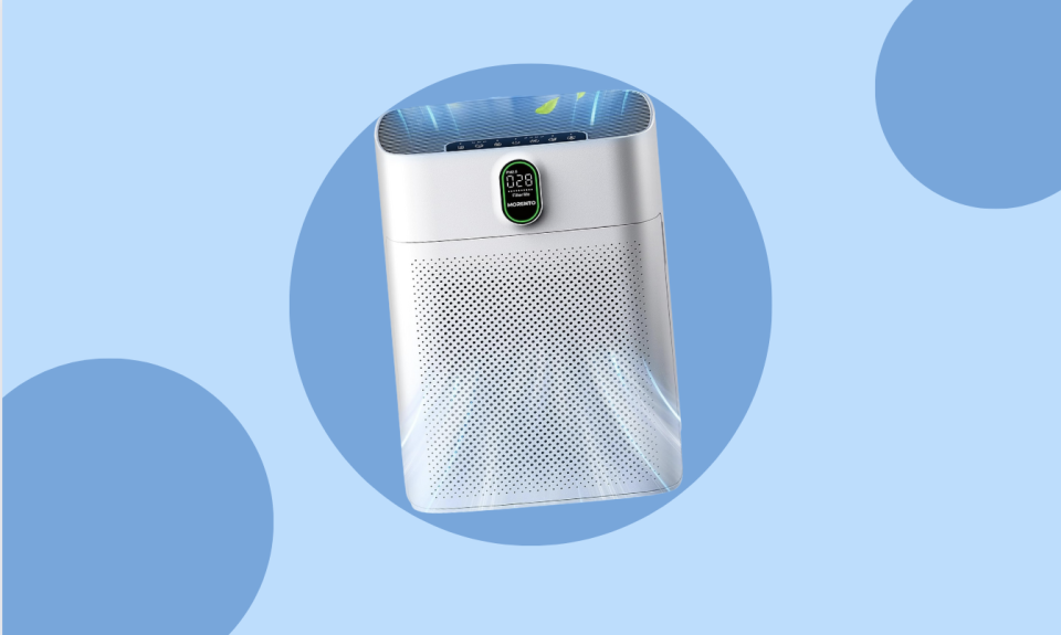 the white air purifier on a blue background