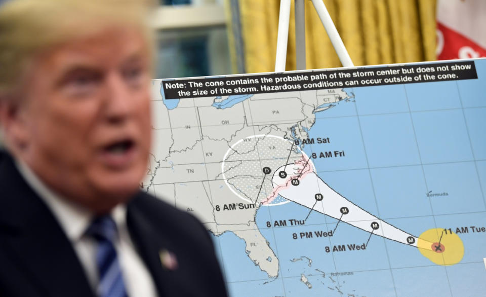 President Donald Trump talks about Hurricane Florence following a briefing in the Oval Office of the White House in Washington, Tuesday, Sept. 11, 2018. (AP Photo/Susan Walsh)