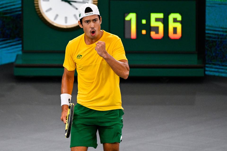 Seen here, Australia's Jason Kubler celebrates during his win in the Davis Cup rubber against Belgium in Hamburg.