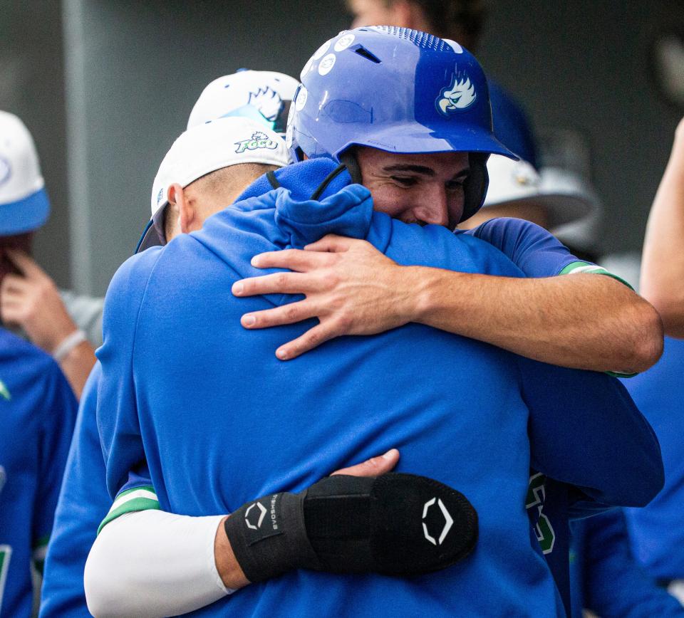 Brian Ellis, an outfielder for the Florida Gulf Coast University baseball team is congratulated during a game against FAU at FGCU on Tuesday, April 11, 2023. He broke the NCAA record for most consecutive times for reaching base at 102 games.
