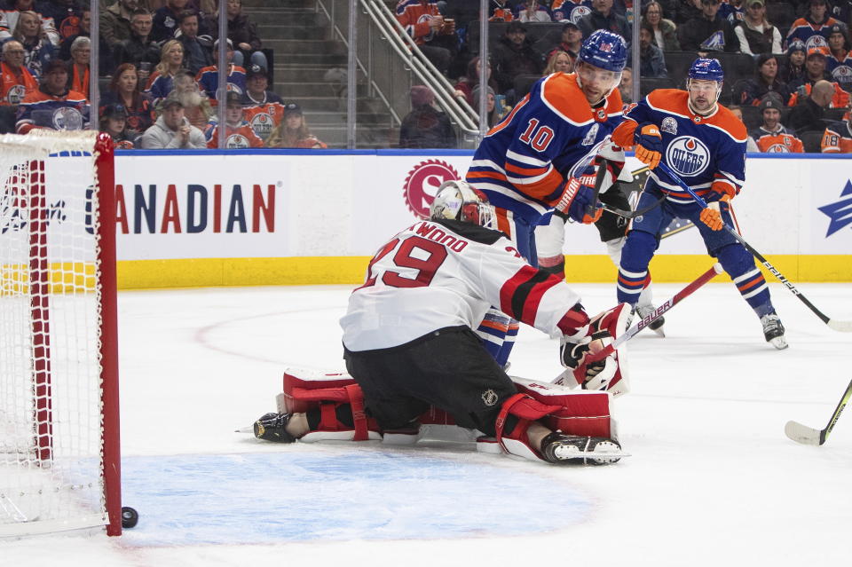 New Jersey Devils' goalie MacKenzie Blackwood (29) is scored against by Edmonton Oilers' Derek Ryan (10) during second-period NHL hockey game action in Edmonton, Alberta, Thursday, Nov. 3, 2022. (Jason Franson/The Canadian Press via AP)