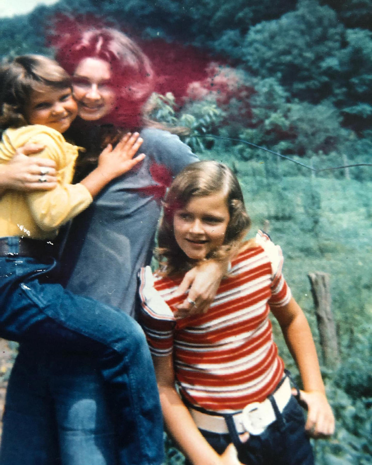 Naomi Judd holds Ashley while Wynonna stands close by in this old photo Ashley shared. (ashley_judd/ Instagram)