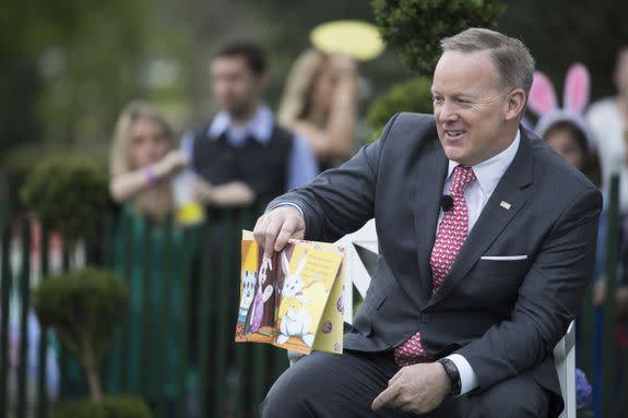 Mandatory Credit: Photo by SHAWN THEW/EPA/REX/Shutterstock (8612849g) Sean Spicer US President Donald J. Trump holds the annual White House Easter Egg Roll, Washington, USA - 17 Apr 2017 White House Press Secretary Sean Spicer reads to children during the White House Easter Egg Roll on the South Lawn of the White House in Washington, DC, USA, 17 April 2017. President Trump and First Lady Melania Trump are hosting thousands of people during the annual celebration of Easter.