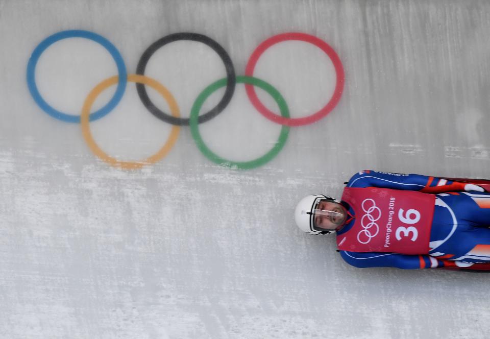 <p>Jozef Ninis of Slovakia takes a corner in a training session for the men’s luge singles during the PyeongChang 2018 Winter Olympic Games, at the Olympic Sliding Centre in PyeongChang on February 8, 2018. (Photo credit should read MARK RALSTON/AFP/Getty Images) </p>