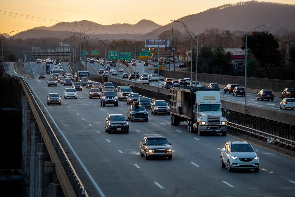 Motorists cross the Capt. Jeff Bowen Bridge in Asheville, November 30, 2023.