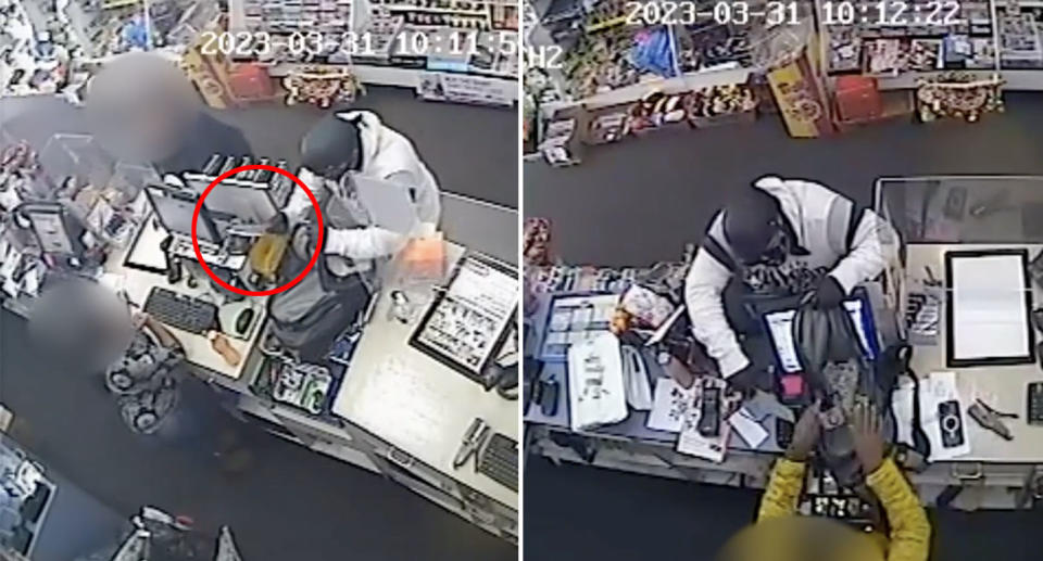 A man dressed in a helmet and face covering points a knife at Australia Post workers in Strathmore, demanding that they hand over money.