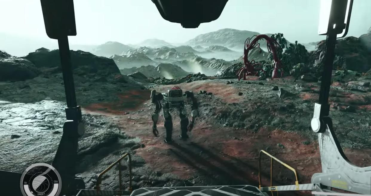  an animated view of a planet landscape. the point of view is a spacecraft gantry and there appear to be multipod aliens in front, surrounded by a rocky landscape 