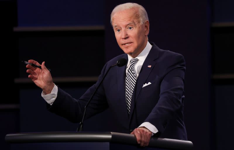 U.S. President Donald Trump and Democratic presidential nominee Joe Biden participate in their first 2020 presidential campaign debate in Cleveland