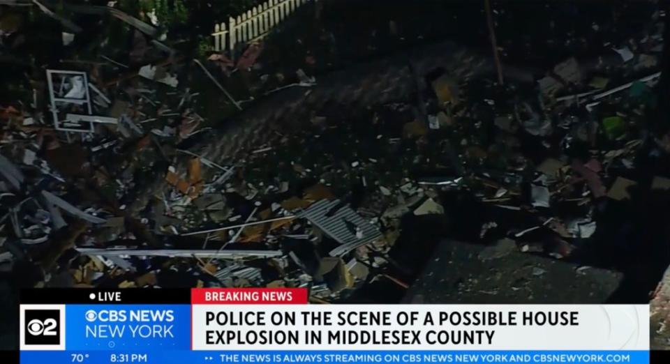 The explosion happened shortly after 7 p.m. at a house on Continental Court in South River, police said. CBS News