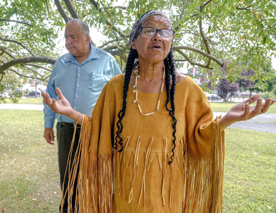 Diana Gray, who is of Narragansett and Pequot descent, hopes to persuade the City of Providence to place statues of prominent Native American leaders in seven parks. She is shown here with Rhode Island Indian Council Executive Director Darrell Waldron outside The Algonquin House in Providence.