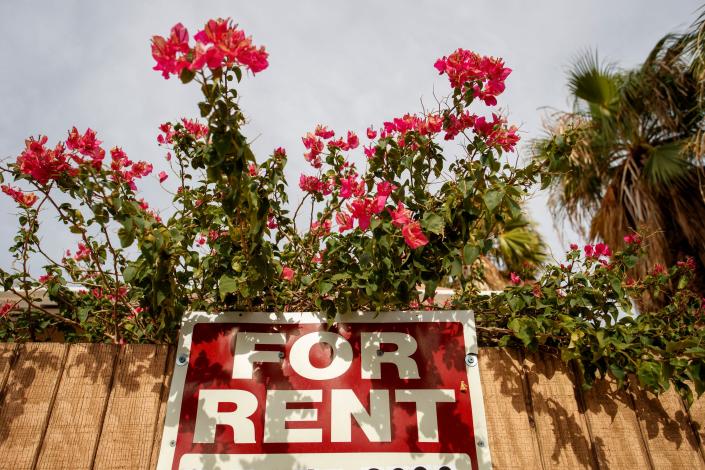 A for rent sign is visible on Indian Canyon Drive outside a small apartment complex in Palm Springs, Calif., on July 21, 2022. Rents have been rising rapidly in recent years. 