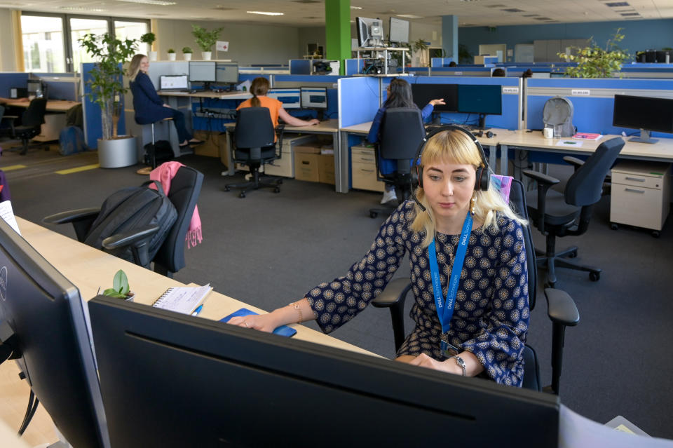 02 June 2022, Saxony-Anhalt, Halle (Saale): In the open-plan office, Tatsiana Hryts works in customer support at Dell Technologies. The company enables women to train and work as IT specialists as career changers. According to the employment agency, many women and girls are not very interested in technical training. This is why a sustainable trend reversal is needed, also because of the ongoing shortage of skilled workers. Photo: Heiko Rebsch/dpa (Photo by Heiko Rebsch/picture alliance via Getty Images)