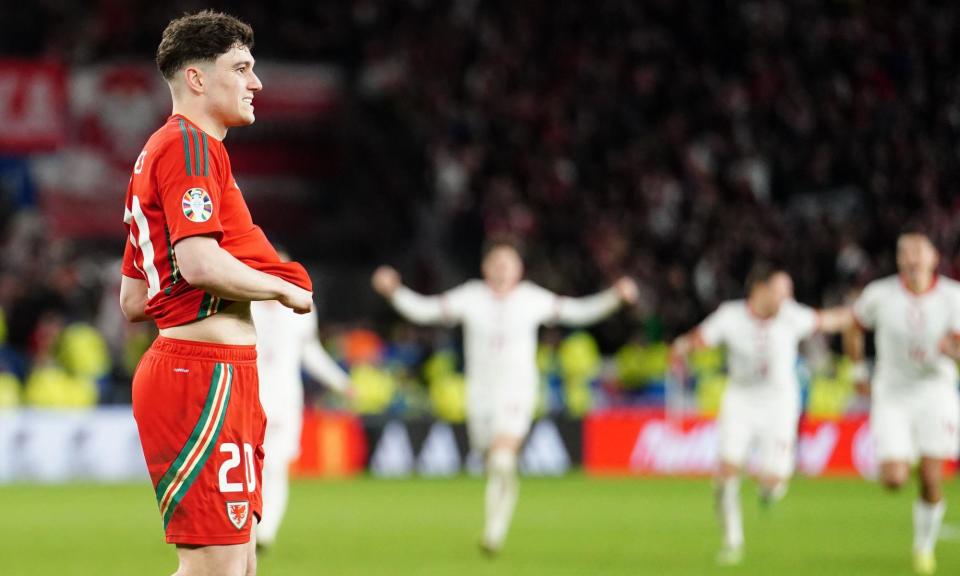 <span>Daniel James is dejected after his penalty miss gave <a class="link " href="https://sports.yahoo.com/soccer/teams/poland/" data-i13n="sec:content-canvas;subsec:anchor_text;elm:context_link" data-ylk="slk:Poland;sec:content-canvas;subsec:anchor_text;elm:context_link;itc:0">Poland</a> a spot at Euro 2024.</span><span>Photograph: David Davies/PA</span>