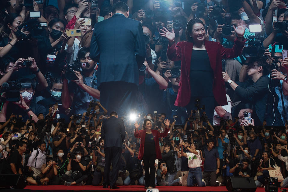 Pheu Thai party candidates Srettha, left, and Paethongtarn Shinawatra, right, at the final campaign event ahead of the upcoming general election, on May 12, 2023. <span class="copyright">Teera Noisakran—Pacific Press/Shutterstock</span>