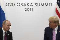 FILE - In this June 28, 2019, file photo President Donald Trump, right, meets with Russian President Vladimir Putin during a bilateral meeting on the sidelines of the G-20 summit in Osaka, Japan. If Trump doesn't extend the New Strategic Arms Reduction Treaty, only remaining U.S.-Russia arms control pact, or succeed in negotiating a replacement treaty, it will expire on Feb. 5, 2021. (AP Photo/Susan Walsh, File)