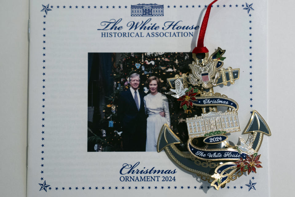 The 2024 White House Christmas Ornament featuring former President Jimmy Carter, is seen at the White House Historical Association Wednesday, Feb. 21, 2024, in Washington. Carter is the first of the U.S. presidents to be honored with an official White House Christmas ornament while still living. (AP Photo/Evan Vucci)