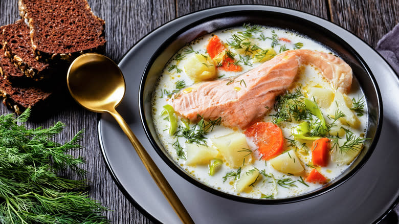 White soup topped with salmon