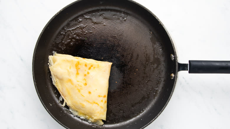 folded crepe in pan