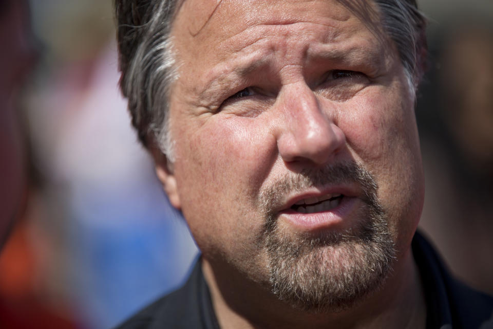 FILE - In this April 2, 2015, file photo, car owner Michael Andretti speaks to a reporter during a news conference in Philadelphia. Alexander Rossi doesn't mince words about last season, when Andretti Autosport won just one race as an organization. "I just think we sucked globally," he said of the effort. Michael Andretti understands the team must be better and in an interview with The Associated Press insisted the turnaround has begun. (AP Photo/Matt Rourke, File)