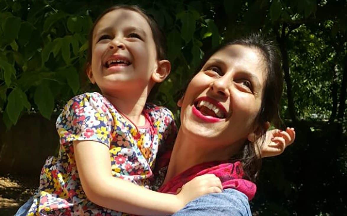 Nazanin Zaghari-Ratcliffe (R) embracing her daughter Gabriella in Damavand following her release from prison for three days - AFP