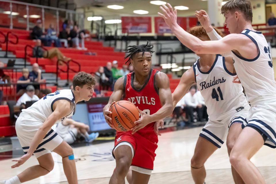 West Lafayette senior Donovan Loudermill (20) drives to the hoop during the IU Health Hoops Classic basketball championship game, West Lafayette vs Harrison, Saturday, Dec. 2, 2023, at Crawley Center in Lafayette, Ind. Harrison won 84-61.