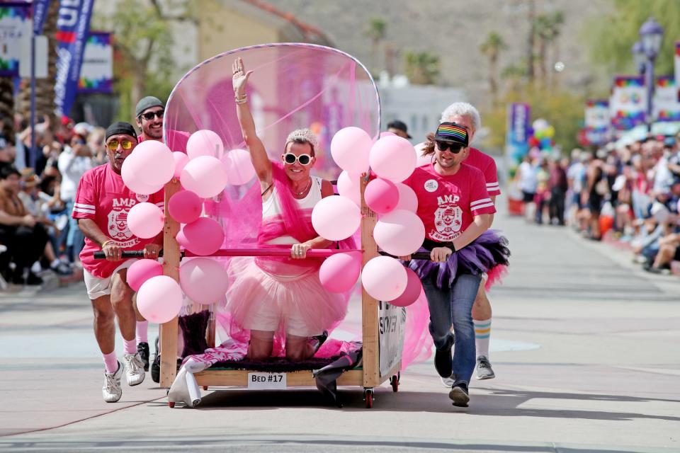 Competitors take part in the annual Bed Race and Parade during Cathedral City LGBT Days in downtown Cathedral City, Calif., on Sunday, March 5, 2023. 