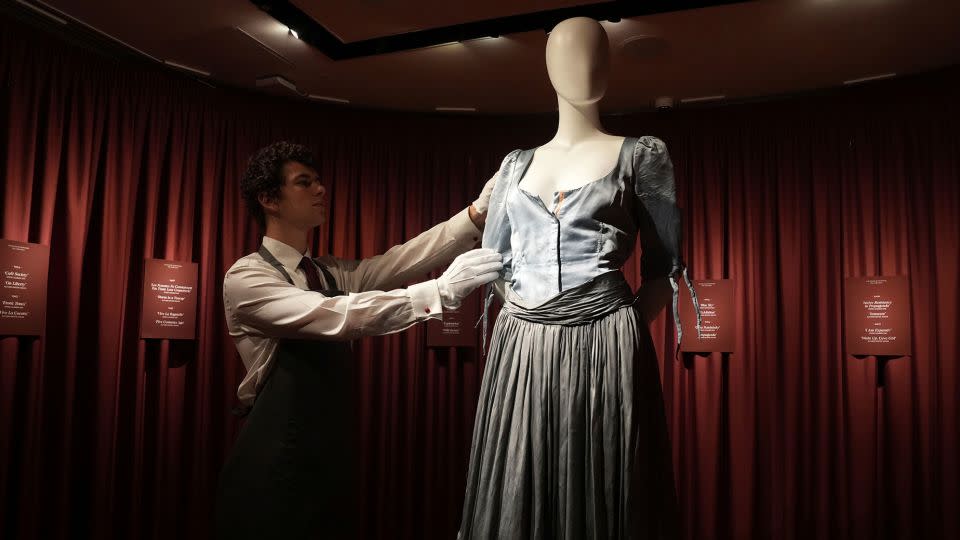 Westwood's "Cinderella dress" from her 2011 Spring/Summer collection will be offered as part of her posthumous wardrobe auction by Christie's in London in June. - Lucy North/AP