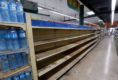 Empty shelves are seen at a supermarket in Havana, Cuba April 4, 2019. REUTERS/Stringer