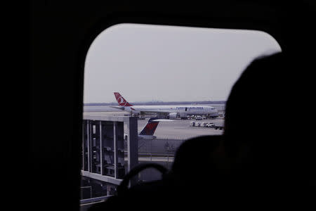 A Turkish Airline plane stands on the runway at JFK International Airport in New York, U.S., March 21, 2017. REUTERS/Lucas Jackson